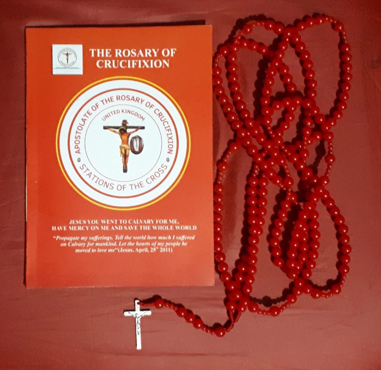The Rosary of Crucifixion book and rosary beads